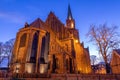 Trzebiatow, zachodniopomorskie / Poland Ã¢â¬â November, 30, 2019: Church illuminated by spotlights at night. Christian temple in